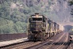 CSX 6697 leads an intermodal of TOFCs west over the Potomac River